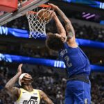 Oct 28, 2024; Dallas, Texas, USA; Dallas Mavericks center Dereck Lively II (2) makes a reverse dunk against the Utah Jazz during the second half at the American Airlines Center. Mandatory Credit: Jerome Miron-Imagn Images
