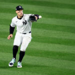 Oct 30, 2024; New York, New York, USA; New York Yankees outfielder Aaron Judge (99) makes a fielding error during the fifth inning against the Los Angeles Dodgers in game five of the 2024 MLB World Series at Yankee Stadium. Mandatory Credit: Wendell Cruz-Imagn Images