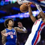 Oct 30, 2024; Philadelphia, Pennsylvania, USA; Detroit Pistons guard Jaden Ivey (23) dunks the ball in front of Philadelphia 76ers guard Kelly Oubre Jr. (9) during the second quarter at Wells Fargo Center. Mandatory Credit: Bill Streicher-Imagn Images