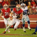 Oct 27, 2024; Santa Clara, California, USA; San Francisco 49ers tight end George Kittle (85) carries the ball against the Dallas Cowboys during the second quarter at Levi's Stadium.
