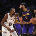 Oct 25, 2024; Los Angeles, California, USA; Los Angeles Lakers forward Anthony Davis (3) looks to pass against Phoenix Suns forward Kevin Durant (35) during the second half at Crypto.com Arena.