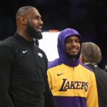 Oct 25, 2024; Los Angeles, California, USA; Los Angeles Lakers guard Bronny James (9) and forward LeBron James (23) warming up before the game against the Phoenix Suns at Crypto.com Arena.