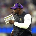 Oct 24, 2024; Inglewood, California, USA; Minnesota Vikings defensive coordinator Brian Flores watches from the sidelines against the Los Angeles Rams in the first half at SoFi Stadium. Mandatory