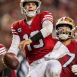 San Francisco 49ers quarterback Brock Purdy (13) spikes the football after scoring the touchdown against the Dallas Cowboys during the third quarter at Levi's Stadium.