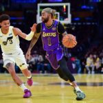 Los Angeles Lakers guard D’Angelo Russell (1) moves the ball against against Utah Jazz guard Keyonte George (3) during the first half at Crypto.com Arena.