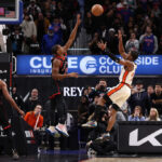 DETROIT, MICHIGAN - NOVEMBER 25: Jaden Ivey #23 of the Detroit Pistons makes a game winning shot over Ochai Agbaji #30 of the Toronto Raptors for a 102-100 win at Little Caesars Arena on November 25, 2024 in Detroit, Michigan. NOTE TO USER: User expressly acknowledges and agrees that, by downloading and or using this photograph, User is consenting to the terms and conditions of the Getty Images License. (Photo by Gregory Shamus/Getty Images)