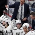 Los Angeles Kings interim head coach Jim Hiller (top) reacts on the bench against the Pittsburgh Penguins during the second period at PPG Paints Arena.