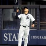 New York Yankees outfielder Juan Soto (22) makes a catch during the second inning against the Los Angeles Dodgers in game five of the 2024 MLB World Series at Yankee Stadium.