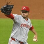 Cincinnati Reds relief pitcher Justin Wilson (32) pitches in the the sixth inning against the Cleveland Guardians at Progressive Field.
