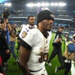 Baltimore Ravens quarterback Lamar Jackson (8) leaves the field after the game against the Los Angeles Chargers at SoFi Stadium.