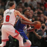 Feb 11, 2022; Chicago, Illinois, USA; NBA; Minnesota Timberwolves forward Anthony Edwards (1) is defended by Chicago Bulls guard Zach LaVine (8) during the first half at the United Center.