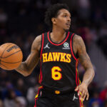 Mar 7, 2022; Detroit, Michigan, USA; Atlanta Hawks guard Lou Williams (6) dribbles the ball during the second quarter against the Detroit Pistons at Little Caesars Arena.