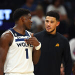 Nov 1, 2022; Phoenix, Arizona, USA; NBA; Minnesota Timberwolves guard Anthony Edwards (left) and Phoenix Suns guard Devin Booker at Footprint Center.
