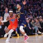 Apr 4, 2023; San Francisco, California, USA; Oklahoma City Thunder guard Shai Gilgeous-Alexander (2) dribbles the ball next to Golden State Warriors guard Stephen Curry (30) in the second quarter at the Chase Center.
