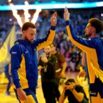 Nov 1, 2023; San Francisco, California, USA; Golden State Warriors guard Stephen Curry (30) exchanges high fives with guard Klay Thompson (11) before the start of the game against the Sacramento Kings at the Chase Center. Mandatory Credit: Cary Edmondson-USA TODAY Sports