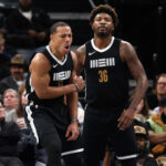 Nov 10, 2023; Memphis, Tennessee, USA; Memphis Grizzlies guards Desmond Bane (22) and Marcus Smart (36) react during the first half against the Utah Jazz at FedExForum.