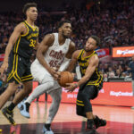 Nov 11, 2023; San Francisco, California, USA; Golden State Warriors guard Stephen Curry (30) steals the basketball from Cleveland Cavaliers guard Donovan Mitchell (45) during the second quarter at Chase Center.