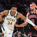Nov 13, 2023; Milwaukee, Wisconsin, USA; Milwaukee Bucks forward Giannis Antetokounmpo (34) drives to the basket against Chicago Bulls guard Zach LaVine (8) in the fourth quarter at Fiserv Forum.