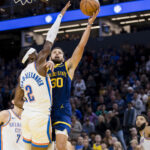 Nov 18, 2023; San Francisco, California, USA; NBA; Oklahoma City Thunder guard Shai Gilgeous-Alexander (2) defends Golden State Warriors guard Stephen Curry (30) during the second half at Chase Center.