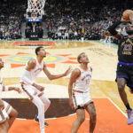 Dec 15, 2023; San Antonio, Texas, USA; NBA; Los Angeles Lakers guard LeBron James (23) shoots over San Antonio Spurs forwards Keldon Johnson (3), Victor Wembanyama (1) and forward Jeremy Sochan (10) during the first half at Frost Bank Center.