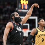 Jan 26, 2024; Toronto, Ontario, CAN; Los Angeles Clippers guard James Harden (1) follows through on a shot against the Toronto Raptors in the second half at Scotiabank Arena.