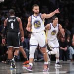 Feb 5, 2024; Brooklyn, New York, USA; NBA; Golden State Warriors guard Stephen Curry (30) reacts after making a three point basket during the first half against the Brooklyn Nets at Barclays Center.