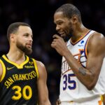 Feb 10, 2024; San Francisco, California, USA; NBA; Golden State Warriors guard Stephen Curry (30) and Phoenix Suns forward Kevin Durant (35) talk during the second half at Chase Center.