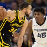 Mar 20, 2024; San Francisco, California, USA; Golden State Warriors guard Stephen Curry (30) looks to drive around Memphis Grizzlies forward GG Jackson II (45) during the third quarter at Chase Center. Mandatory Credit: D. Ross Cameron-USA TODAY Sports