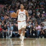 Mar 25, 2024; San Antonio, Texas, USA; San Antonio Spurs guard Devin Vassell (24) dribbles in the first half against the Phoenix Suns at Frost Bank Center.