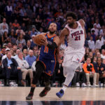 Apr 30, 2024; New York, New York, USA; New York Knicks guard Jalen Brunson (11) drives to the basket against Philadelphia 76ers center Joel Embiid (21) during overtime in game 5 of the first round of the 2024 NBA playoffs at Madison Square Garden.