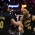May 5, 2024; Cleveland, Ohio, USA; Cleveland Cavaliers guard Donovan Mitchell (45) celebrates with guard Darius Garland (10) after Garland hit a three point basket during the second half against the Orlando Magic in game seven of the first round for the 2024 NBA playoffs at Rocket Mortgage FieldHouse.
