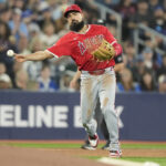 Aug 23, 2024; Toronto, Ontario, CAN; Los Angeles Angels third baseman Anthony Rendon (6) throws out Toronto Blue Jays shortstop Ernie Clement (not pictured) at first base during the sixth inning at Rogers Centre. Mandatory Credit: John E. Sokolowski-USA TODAY Sports
