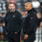 Las Vegas Raiders coach Antonio Pierce (right) and pass game coordinator Scott Turner during the San Francisco 49ers in the first half at Allegiant Stadium.