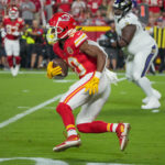 Sep 5, 2024; Kansas City, Missouri, USA; Kansas City Chiefs running back Isiah Pacheco (10) runs the ball against the Baltimore Ravens during the game at GEHA Field at Arrowhead Stadium. Mandatory Credit: Denny Medley-Imagn Images