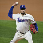 Sep 17, 2024; Arlington, Texas, USA; Texas Rangers starting pitcher Nathan Eovaldi (17) pitches against the Toronto Blue Jays during the first inning at Globe Life Field. Mandatory Credit: Jerome Miron-Imagn Images