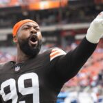 Sep 22, 2024; Cleveland, Ohio, USA; Cleveland Browns defensive end Za'Darius Smith (99) reacts to fans before the game between the Browns and the New York Giants at Huntington Bank Field. Mandatory Credit: Ken Blaze-Imagn Images