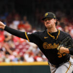 Sep 22, 2024; Cincinnati, Ohio, USA; Pittsburgh Pirates starting pitcher Paul Skenes (30) pitches against the Cincinnati Reds in the third inning at Great American Ball Park.