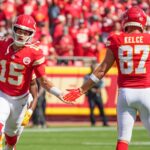 Sep 15, 2024; Kansas City, Missouri, USA; Kansas City Chiefs quarterback Patrick Mahomes (15) greets tight end Travis Kelce (87) during player introductions against the Cincinnati Bengals prior to a game at GEHA Field at Arrowhead Stadium. Mandatory Credit: Denny Medley-Imagn Images