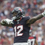 Sep 29, 2024; Houston, Texas, USA; Houston Texans wide receiver Nico Collins (12) signals after a first down during the first quarter against the Jacksonville Jaguars at NRG Stadium. Mandatory Credit: Troy Taormina-Imagn Images