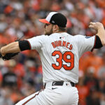 Oct 1, 2024; Baltimore, Maryland, USA; Baltimore Orioles pitcher Corbin Burnes (39) throws a pitch against the Kansas City Royals in the first inning in game one of the Wild Card round for the 2024 MLB Playoffs at Oriole Park at Camden Yards. Mandatory Credit: Tommy Gilligan-Imagn Images- Yankees