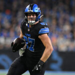 Sep 30, 2024; Detroit, Michigan, USA; Detroit Lions tight end Sam LaPorta (87) runs upfield after catching a pass against the Seattle Seahawks in the second quarter at Ford Field.