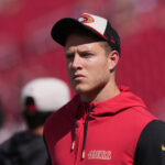 Oct 6, 2024; Santa Clara, California, USA; San Francisco 49ers running back Christian McCaffrey (23) walks on the field before the game against the Arizona Cardinals at Levi's Stadium. Mandatory Credit: Darren Yamashita-Imagn Images