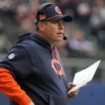 Oct 13, 2024; London, United Kingdom; Chicago Bears offensive coordinator Shane Waldron watches from the sidelines against the Jacksonville Jaguars in the second half during an NFL International Series game at Tottenham Hotspur Stadium. Mandatory Credit: Kirby Lee-Imagn Images