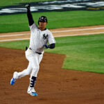 Oct 14, 2024; Bronx, New York, USA; New York Yankees outfielder Juan Soto (22) runs the bases after hitting a solo home run during the third inning against the Cleveland Guardians in game one of the ALCS for the 2024 MLB Playoffs at Yankee Stadium. Mandatory Credit: Vincent Carchietta-Imagn Images