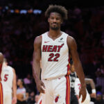 Oct 15, 2024; Miami, Florida, USA; Miami Heat forward Jimmy Butler (22) reacts after arguing with San Antonio Spurs guard Chris Paul (not pictured) during the second quarter at Kaseya Center.