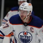 Oct 19, 2024; Dallas, Texas, USA; Edmonton Oilers center Connor McDavid (97) stands in the face off circle against the Dallas Stars in the third period at American Airlines Center. Mandatory Credit: Tim Heitman-Imagn Images