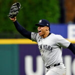 Oct 19, 2024; Cleveland, Ohio, USA; New York Yankees outfielder Juan Soto (22) celebrates after making the final out to beat the Cleveland Guardians during game five of the ALCS for the 2024 MLB playoffs at Progressive Field. Mandatory Credit: David Dermer-Imagn Images