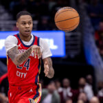 Oct 23, 2024; New Orleans, Louisiana, USA; New Orleans Pelicans guard Jordan Hawkins (24) passes the ball against the Chicago Bulls during the second half at Smoothie King Center.
