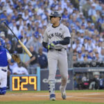 Oct 25, 2024; Los Angeles, California, USA; New York Yankees outfielder Juan Soto (22) reacts after a walk in the first inning against the Los Angeles Dodgers during game one of the 2024 MLB World Series at Dodger Stadium. Mandatory Credit: Jayne Kamin-Oncea-Imagn Images