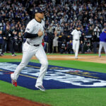Oct 28, 2024; New York, New York, USA; New York Yankees outfielder Juan Soto (22) is introduced before playing against the Los Angeles Dodgers in game three of the 2024 MLB World Series at Yankee Stadium. Mandatory Credit: Brad Penner-Imagn Images